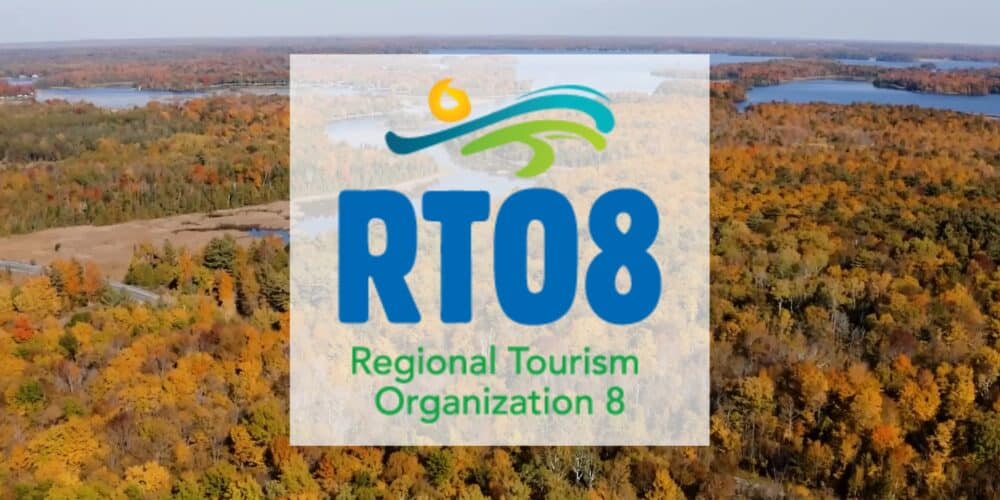 Aerial view of Kawarthas Northumberland region in fall, with RTO8 logo superimposed